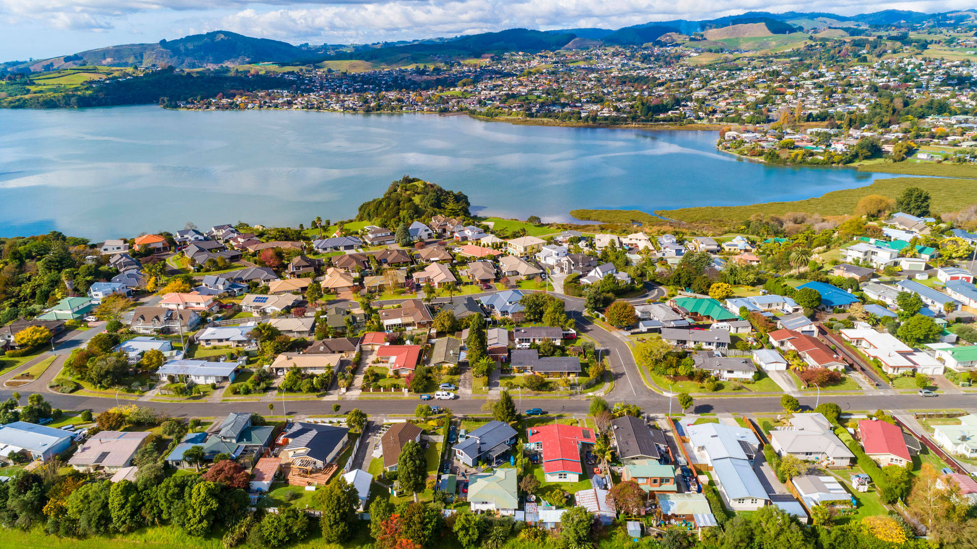 A birds eye view of a suburb of Tauranga in New Zealand with different types of properties.