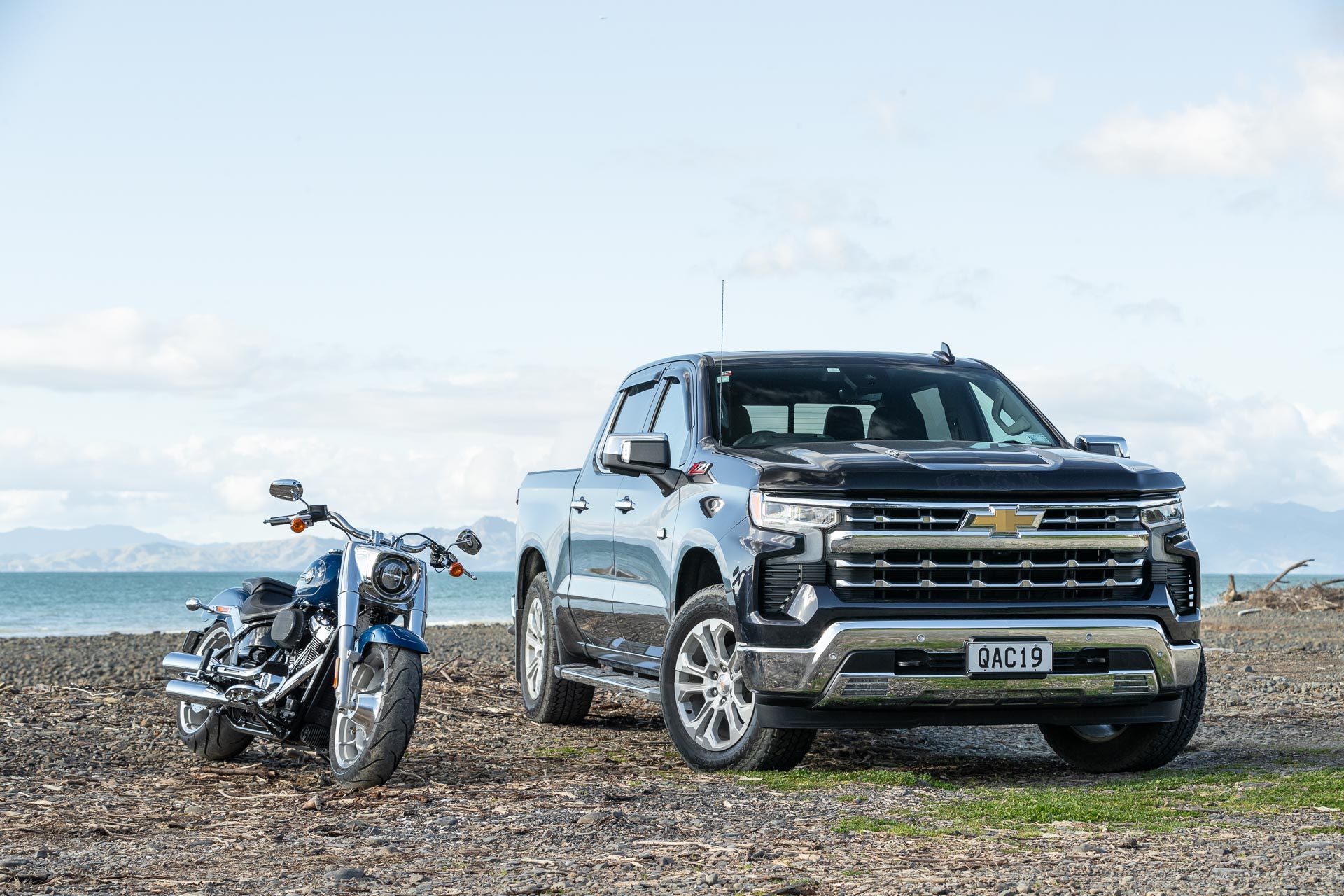 2023 Chevrolet Silverado 1500 LTZ Z71 front view with motorbike