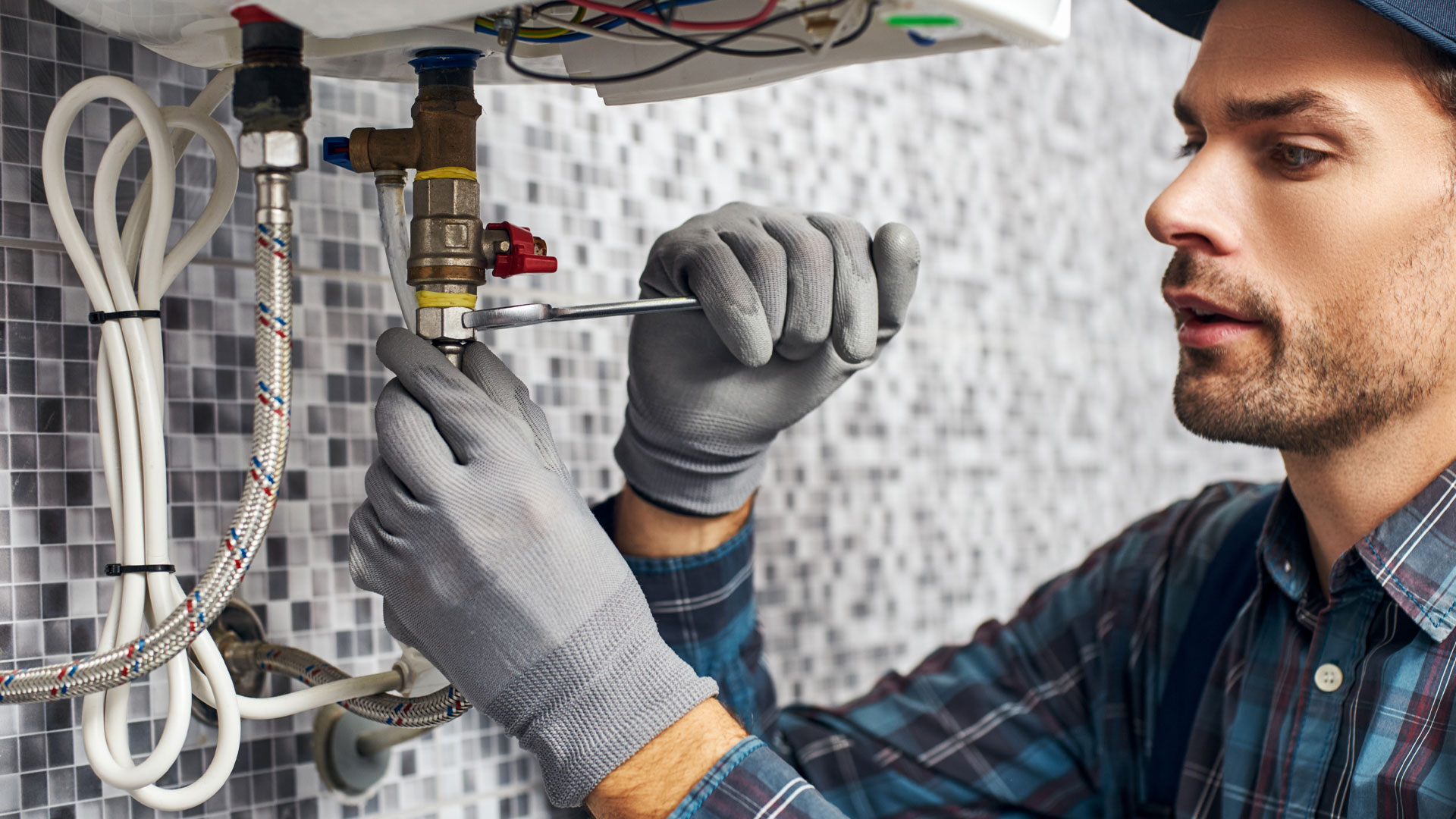 Plumber working in New Zealand.