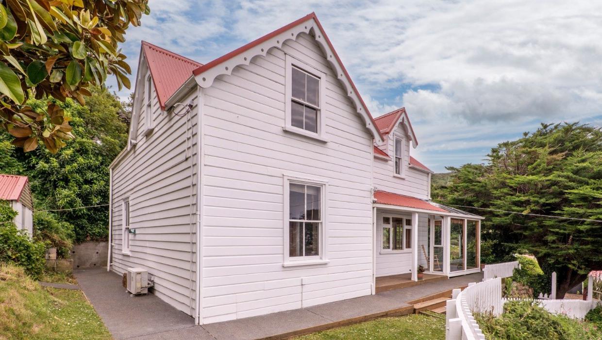 The home sits within the Lyttelton Residential Heritage Area, seen from the outside