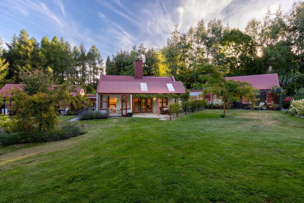 Full garden view with the property and entire landscape shown. 