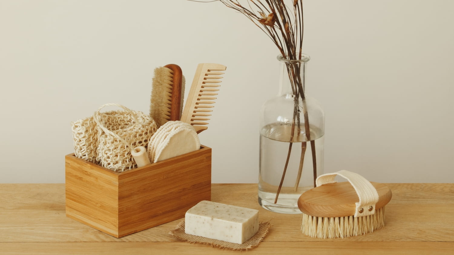 Product line up of sustainable products including brushes, soap and makeup removing pads.