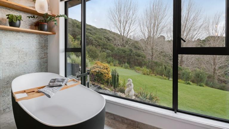 Bath with a view. Photo: HARCOURTS/ TRADE ME