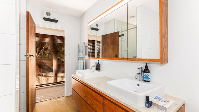 The bathroom has been given a sympathetic makeover. Photo: HARCOURTS/TRADE ME