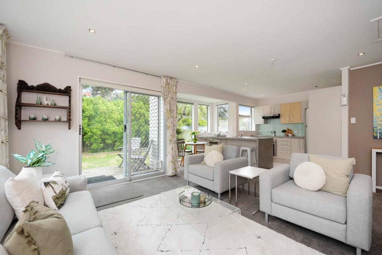 The property has an open plan living and kitchen area. 