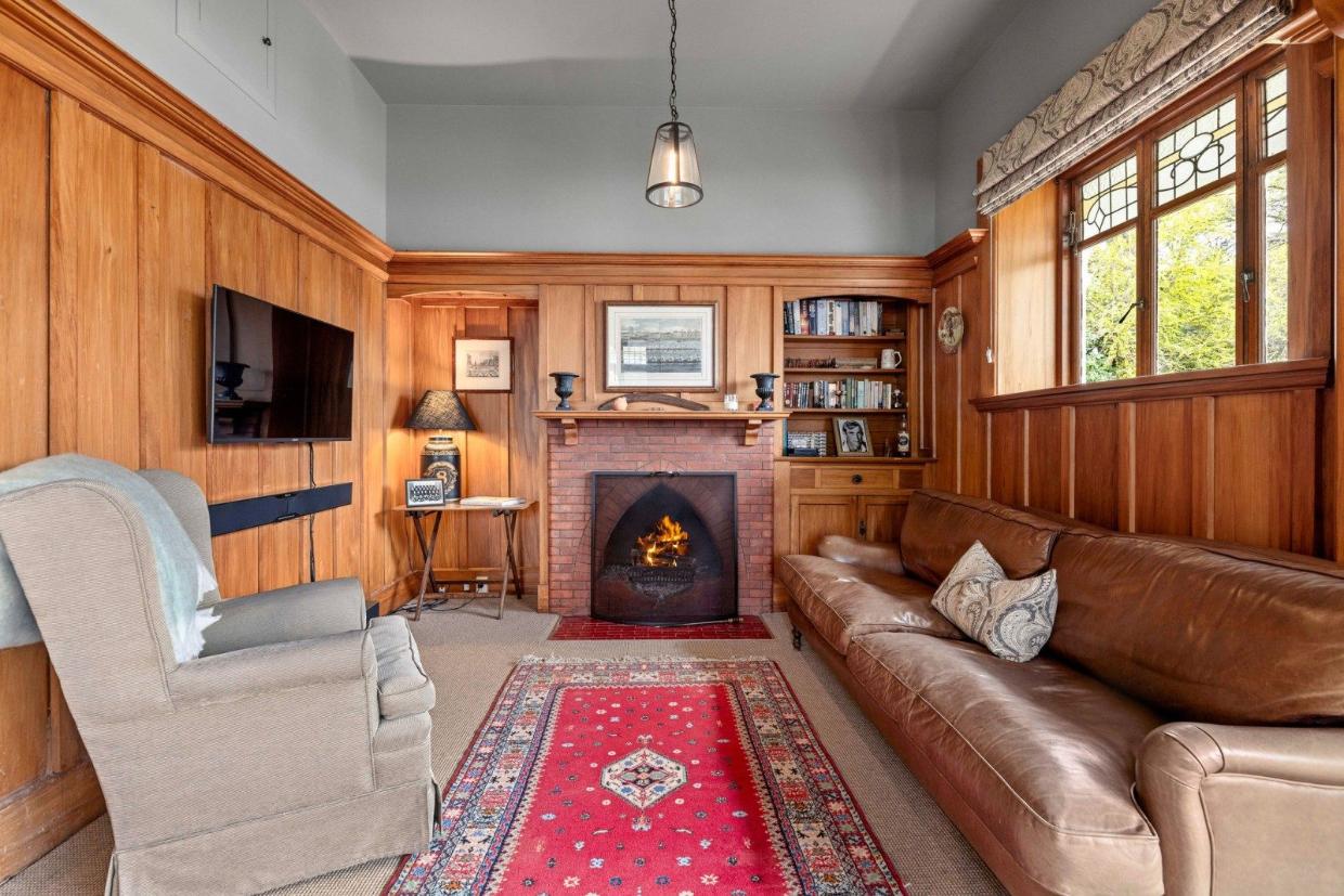 The house includes two cozy reception rooms.