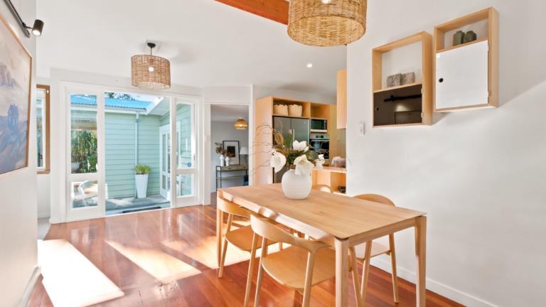 The semi-open plan kitchen diner is the heart of the home. Photo: TRADE ME/RAY WHITE