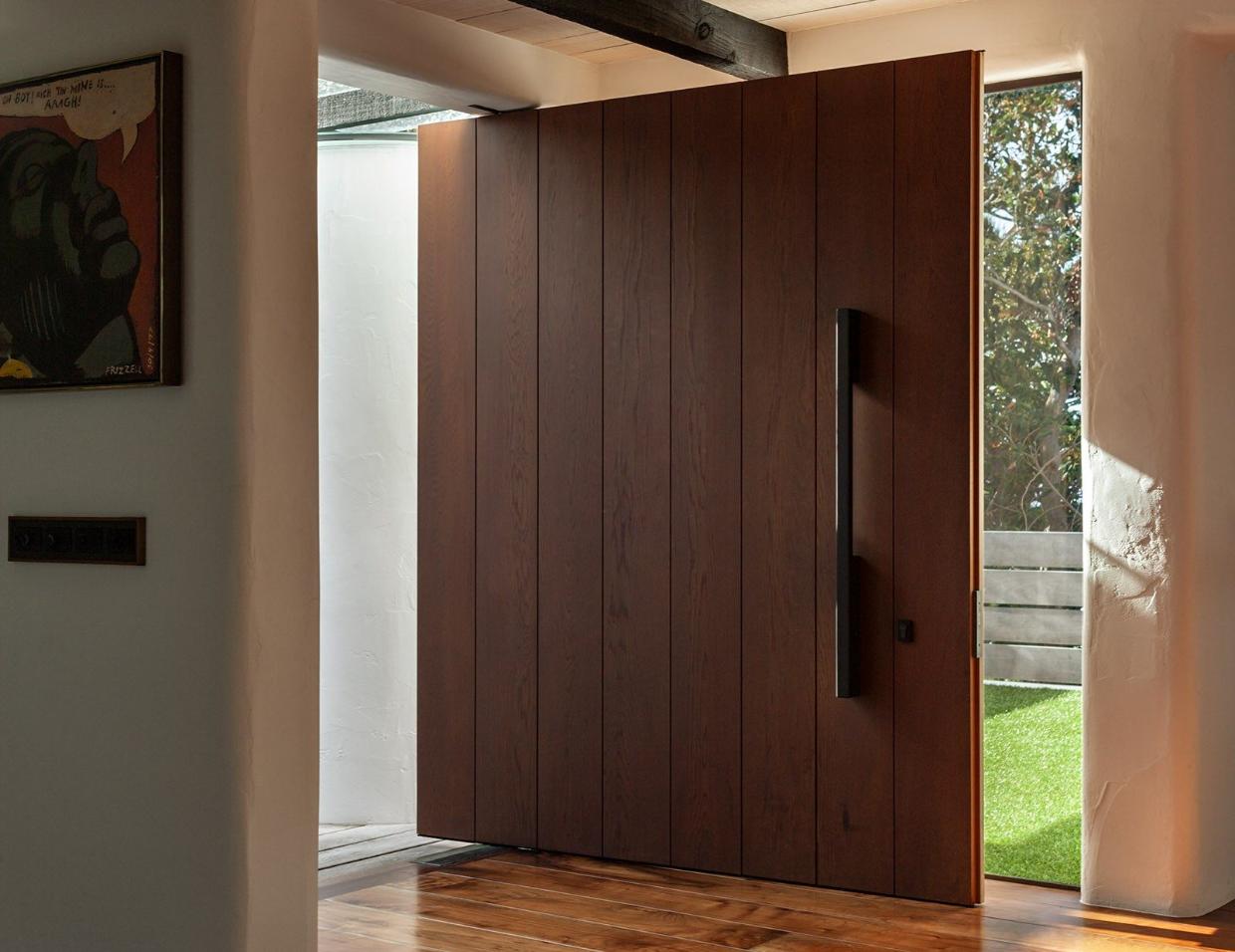 Large door opening out to the gardens.