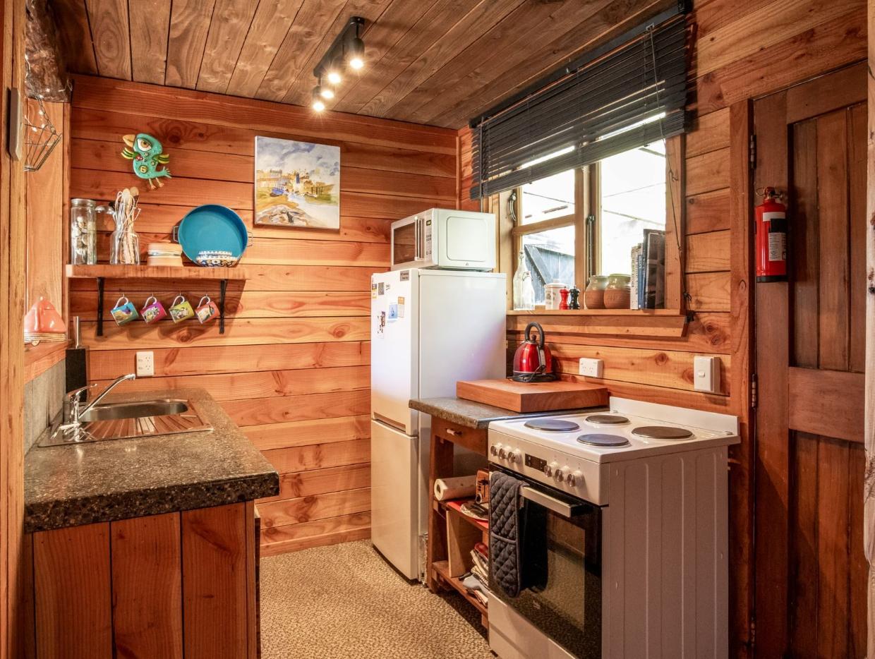 The kitchen is a little on the snug side, but there's room enough to cook a meal.