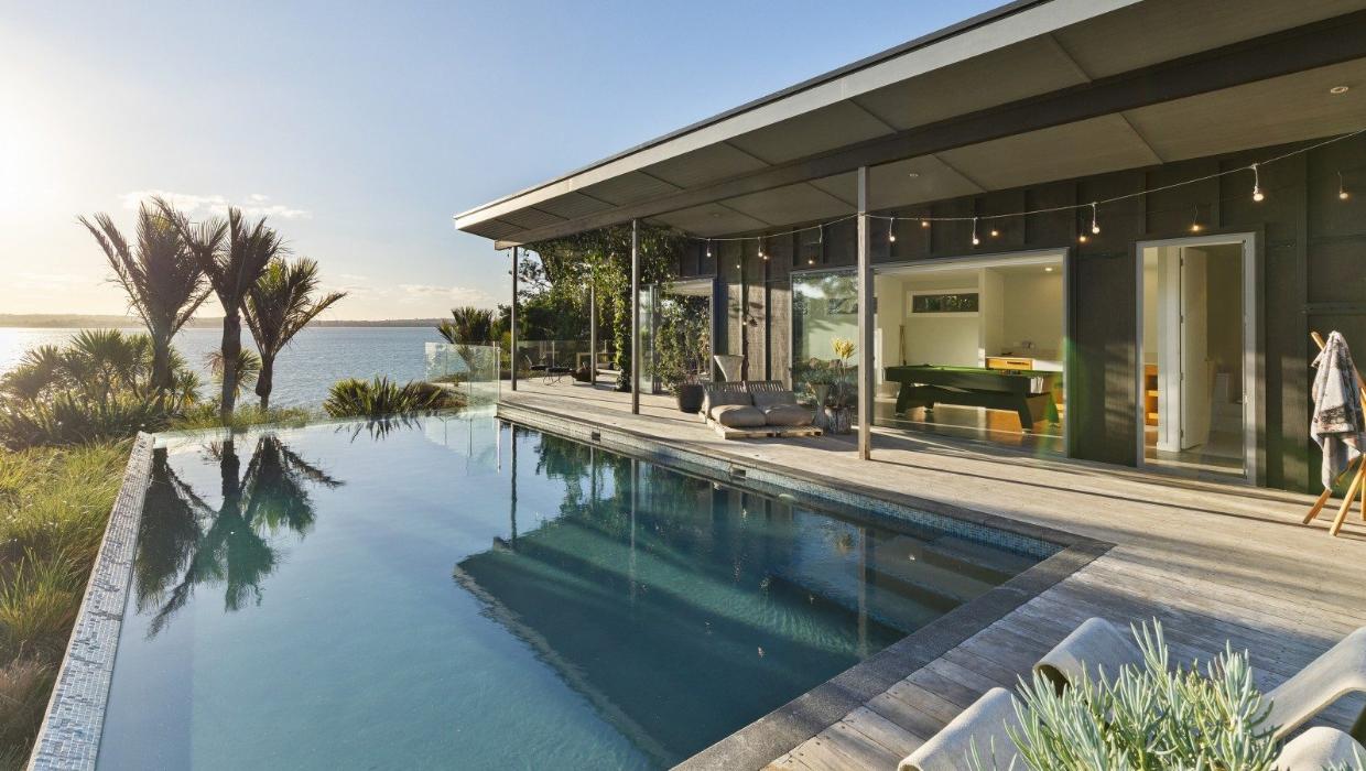 And this is where the teens love to hang out - a pool house where they can have friends stay over. Photo: NZ Sotheby's