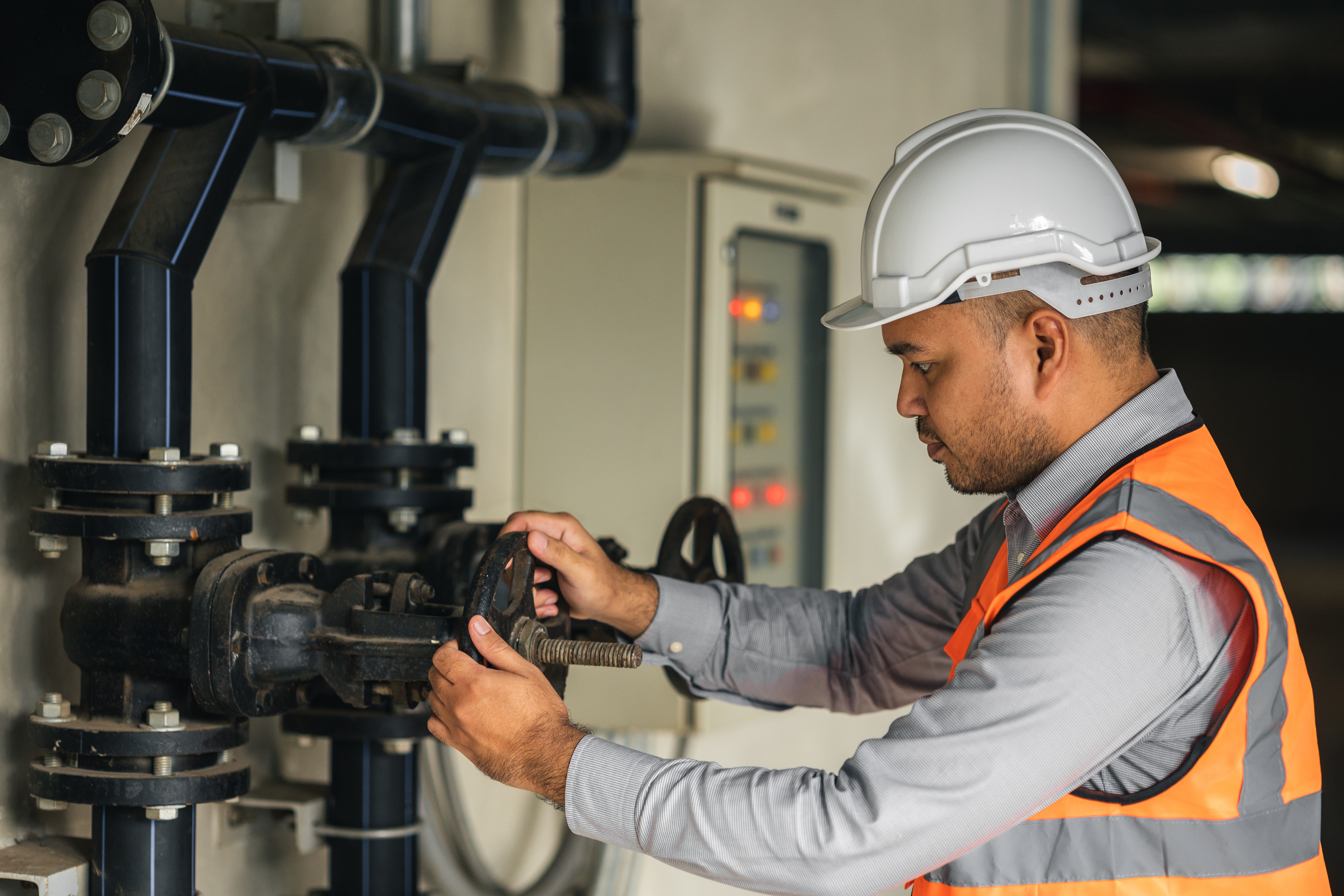 Male tradesperson fixing