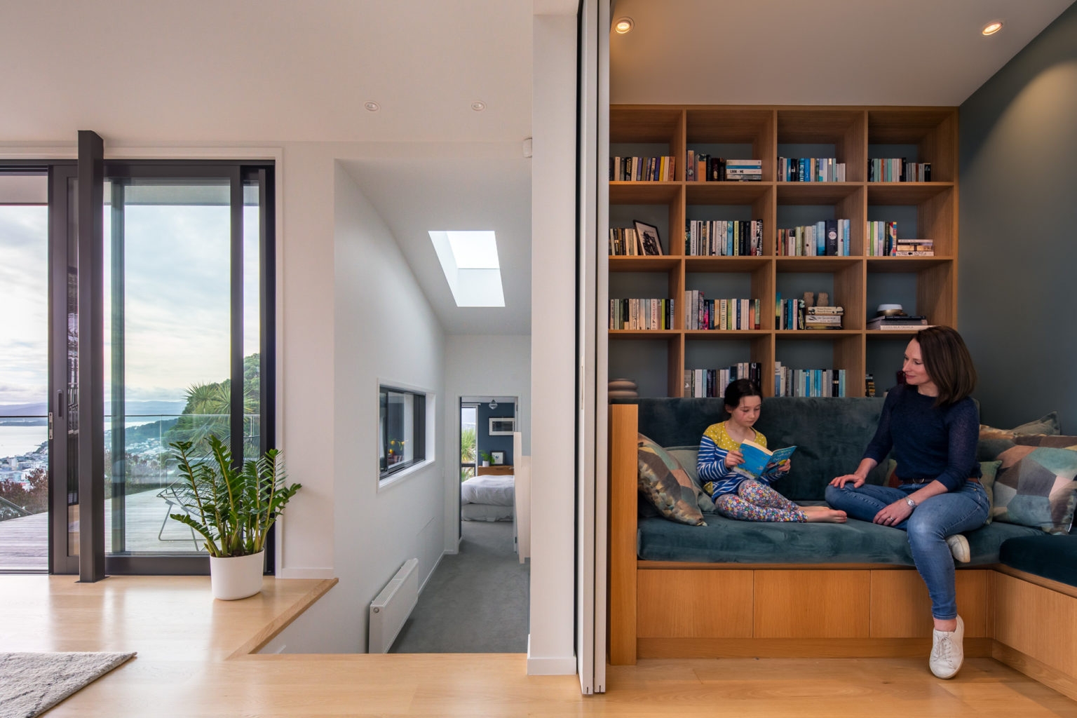 With its corner configuration and custom shelving, this reading nook is a favourite space within the home. Image: Paul McCredie