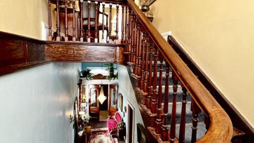 The original staircase, which had been completely destroyed by vandals, is now restored. Photo: TRADE ME/ONE AGENCY