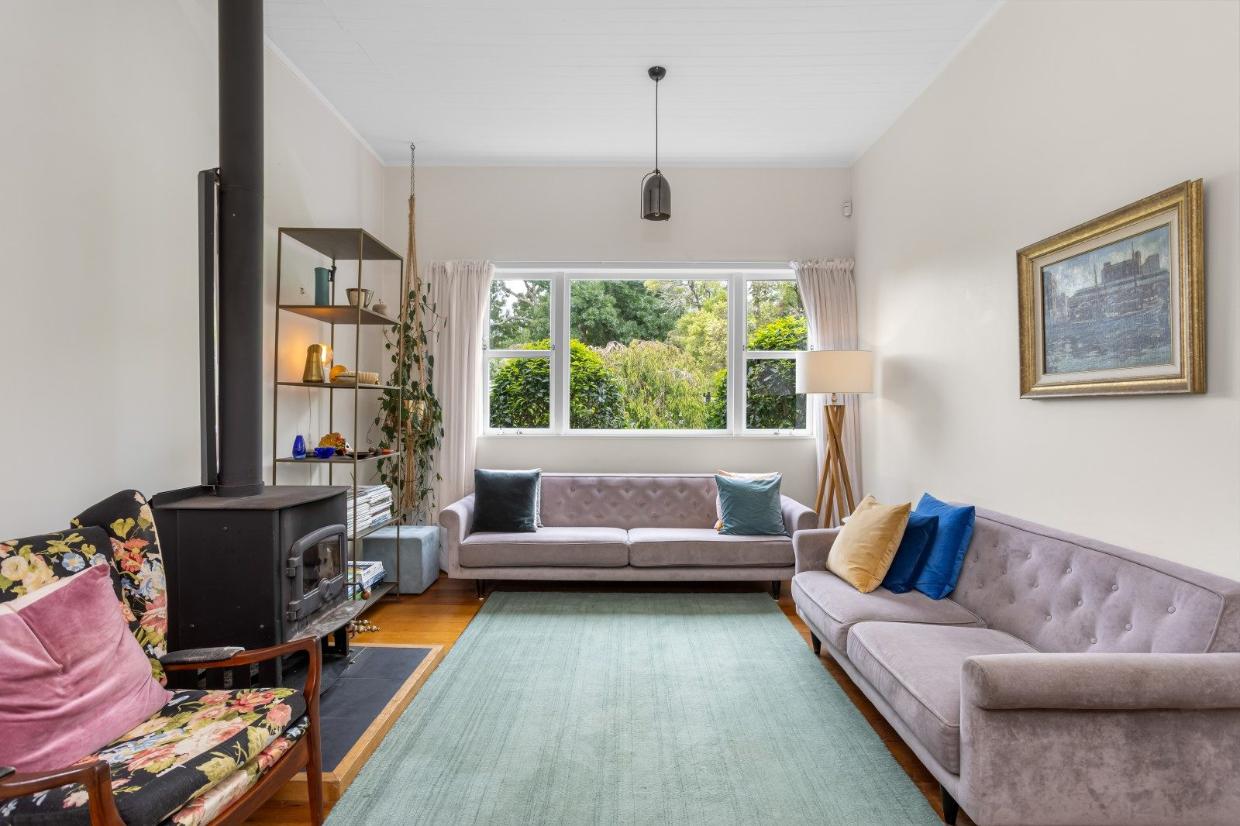Polished floorboards feature in the living room. 