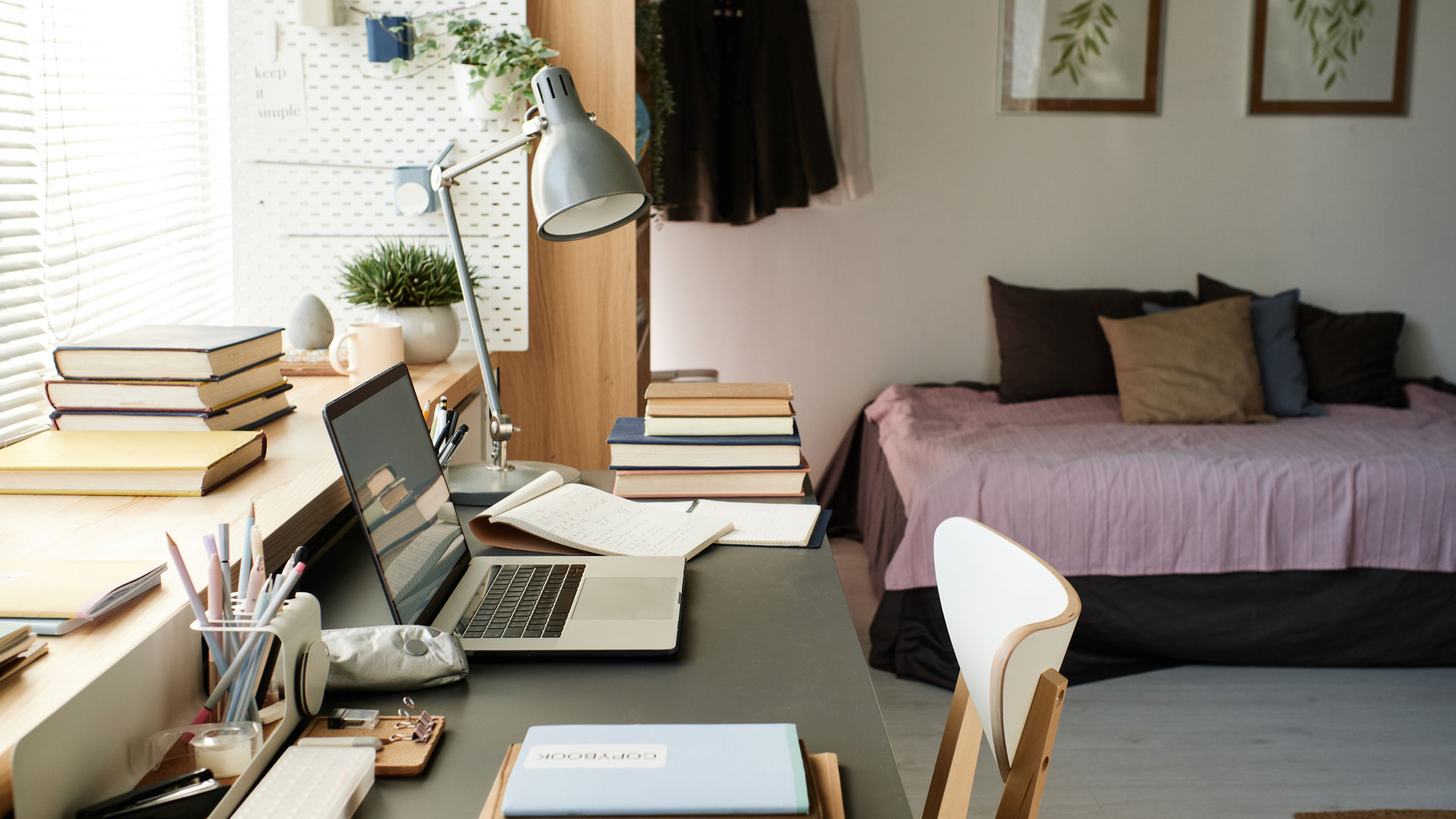 A home office space incorporated in a bedroom in New Zealand.