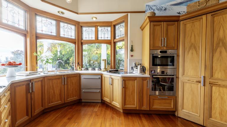 The kitchen wraps around one octagonal end of the house. Photo: Harcourts