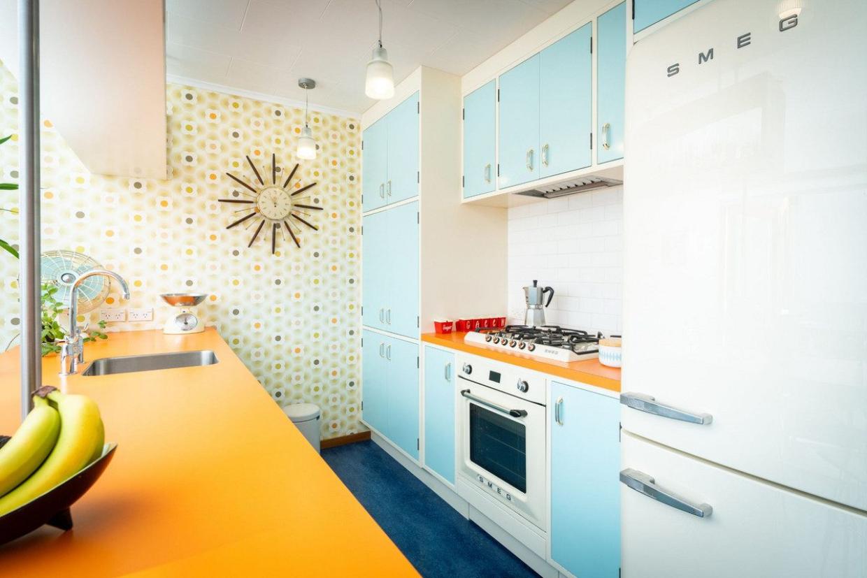 The kitchen installer told the couple he usually pulled out kitchens like this, and it “felt weird” to be putting one into a home. Photo: Lowe & Co
