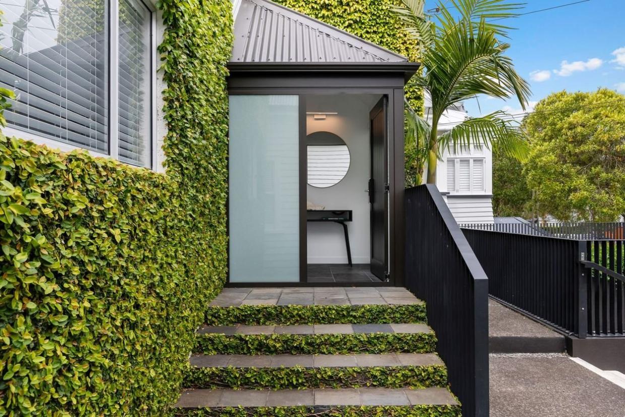 Exterior of ivy covered Ponsonby home