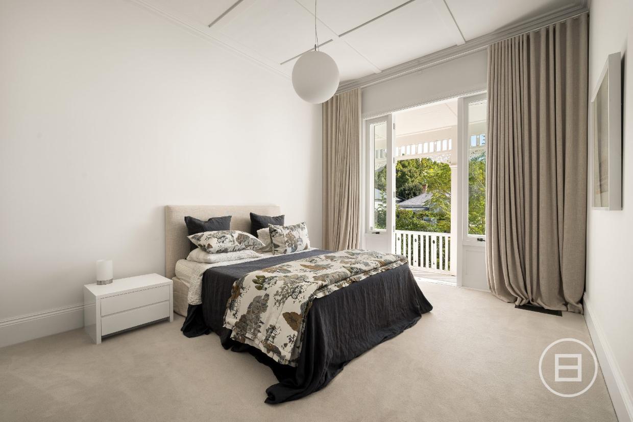 French doors open to the front veranda. 