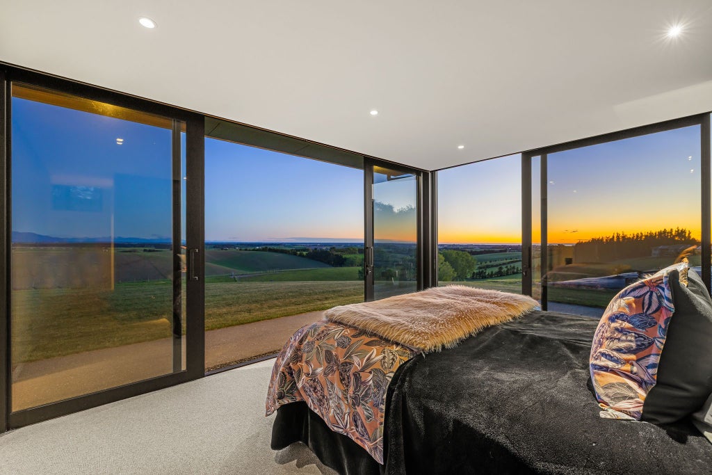 There are four bedrooms. Photo: HARCOURTS/TRADE ME