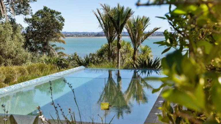 There is access to a jetty at sea level, where the family can fish at high tide. Photo: NZ Sotheby's