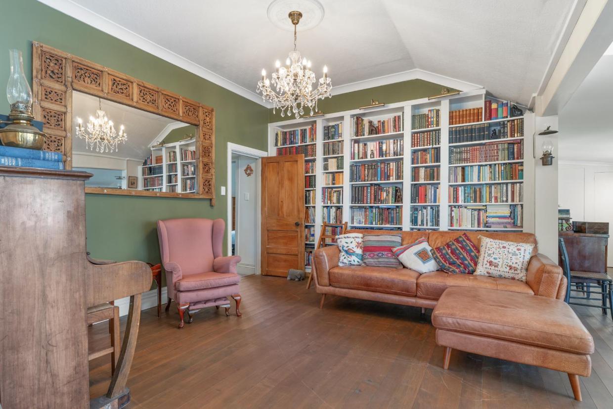 The home has been restored with love and care. The living room is pictured