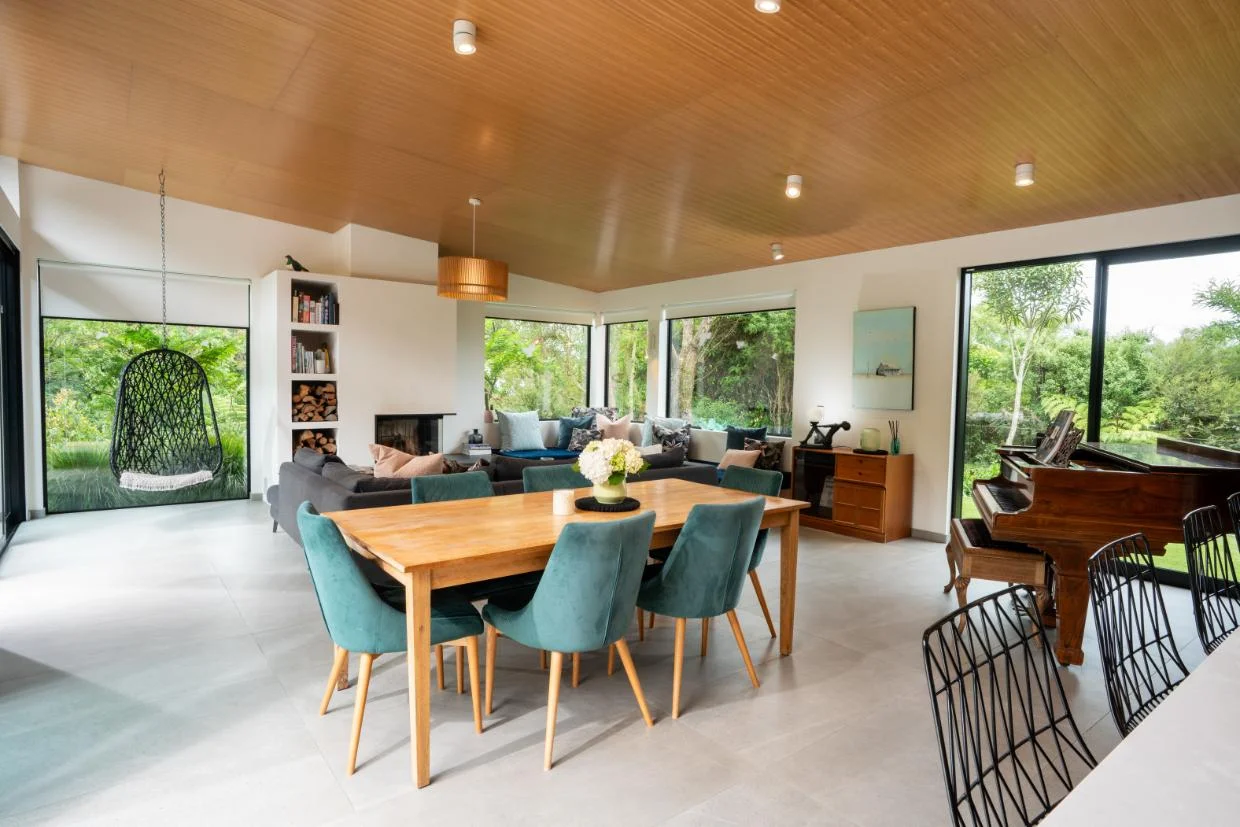 The house has bush views from every window in the dining room.