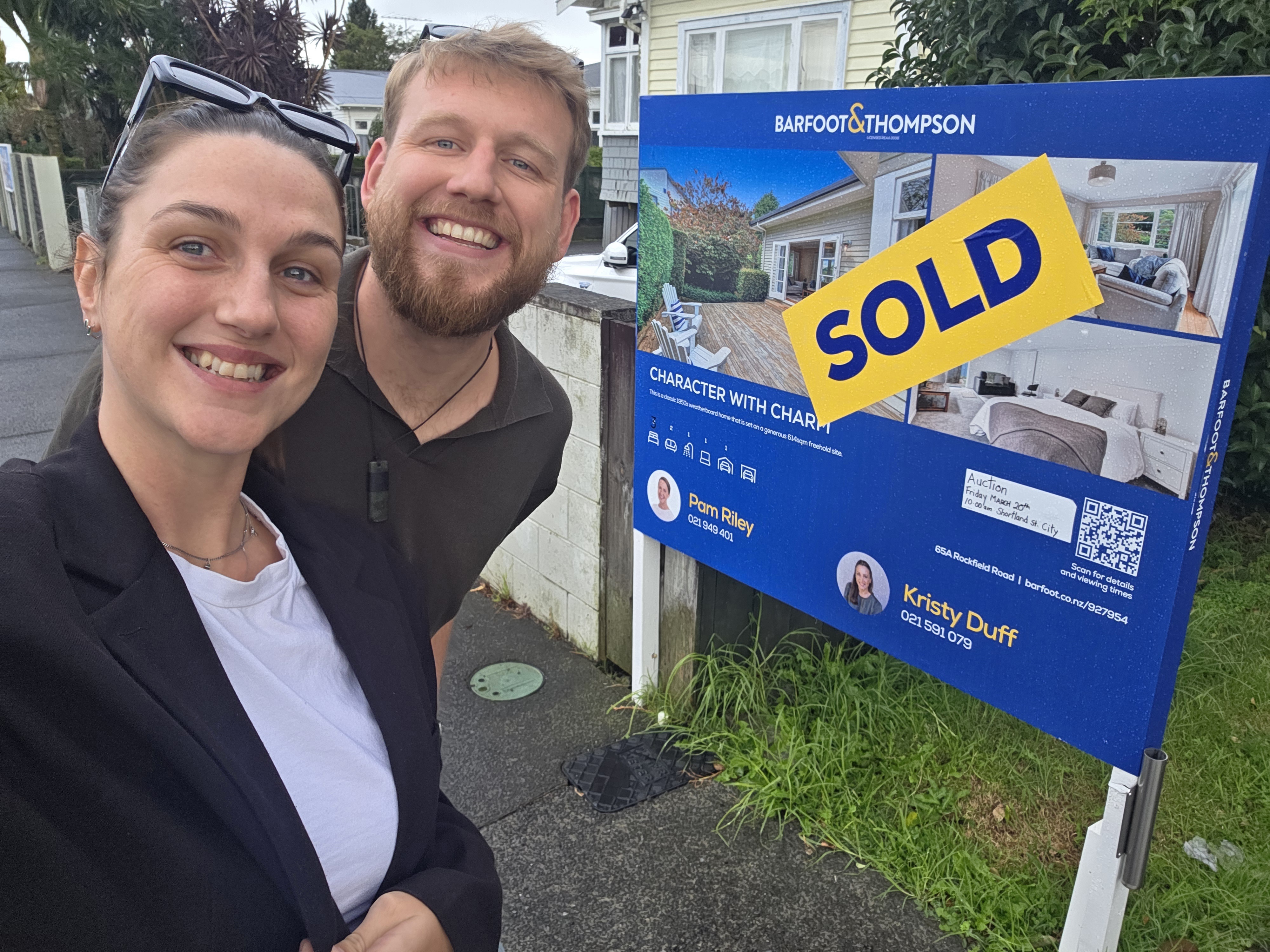 Zach and Zara outside their new home