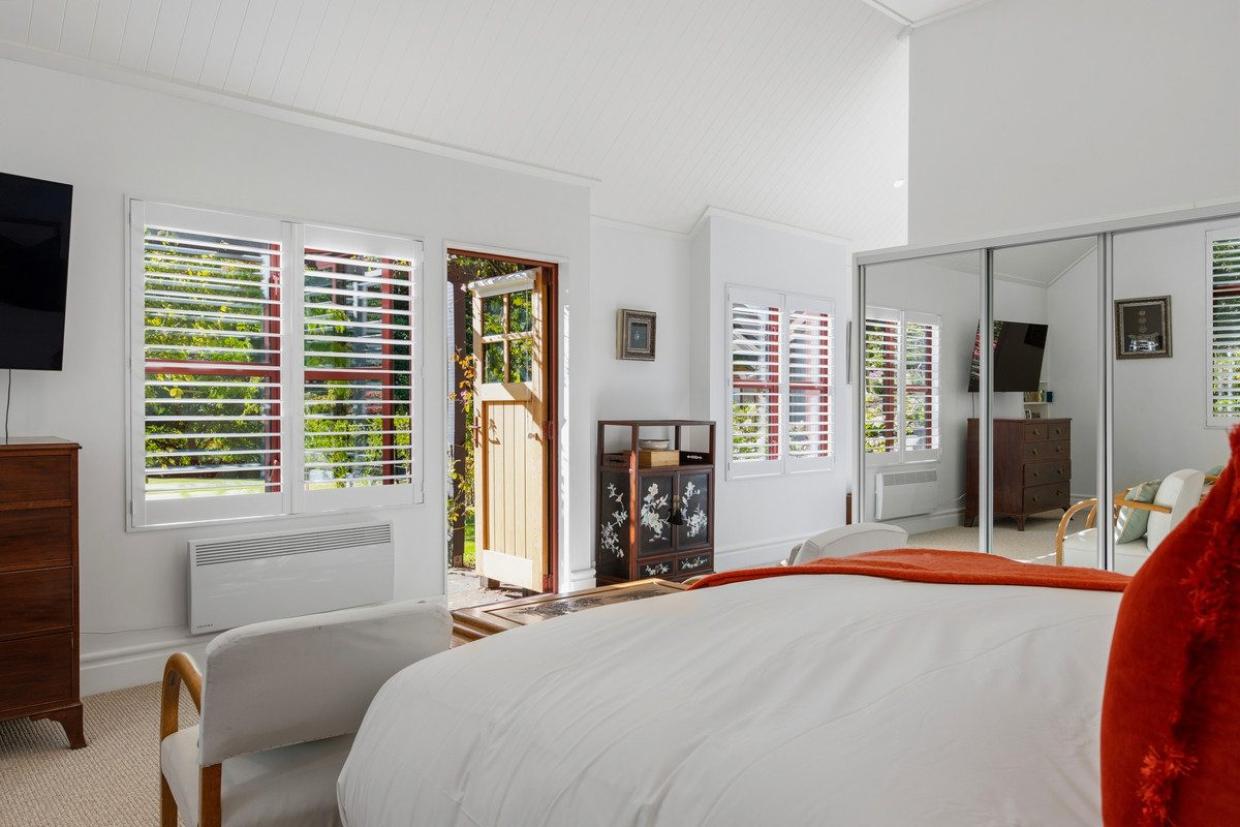 One of the three bedrooms shown