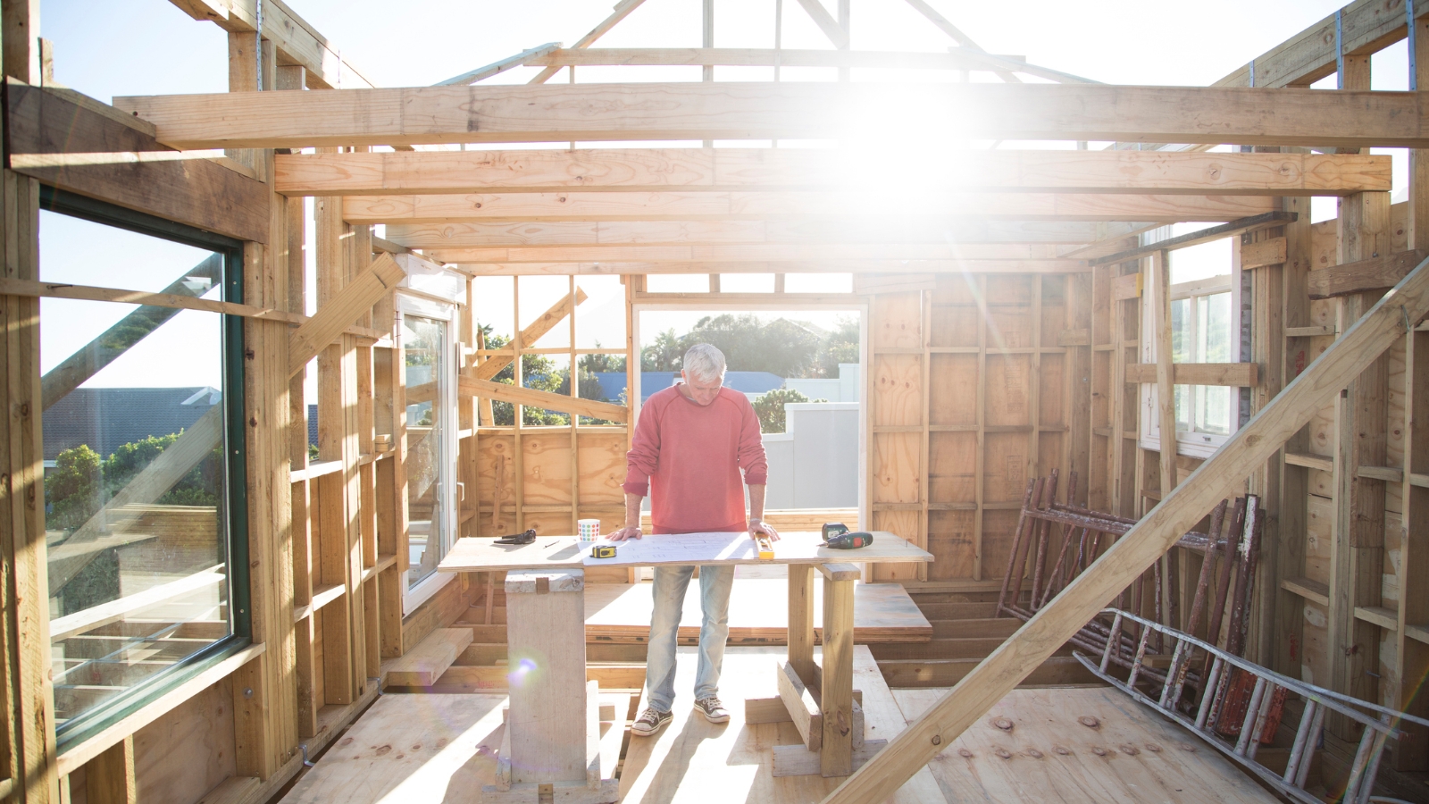 Man building a house.