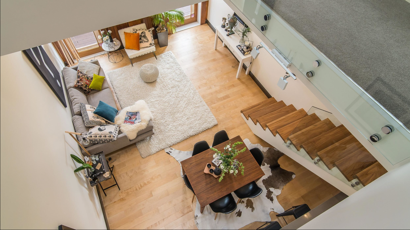 Smaller furniture was chosen here to ensure this compact loft-style space felt voluminous and beautifully functional. Image: Paul McCredie