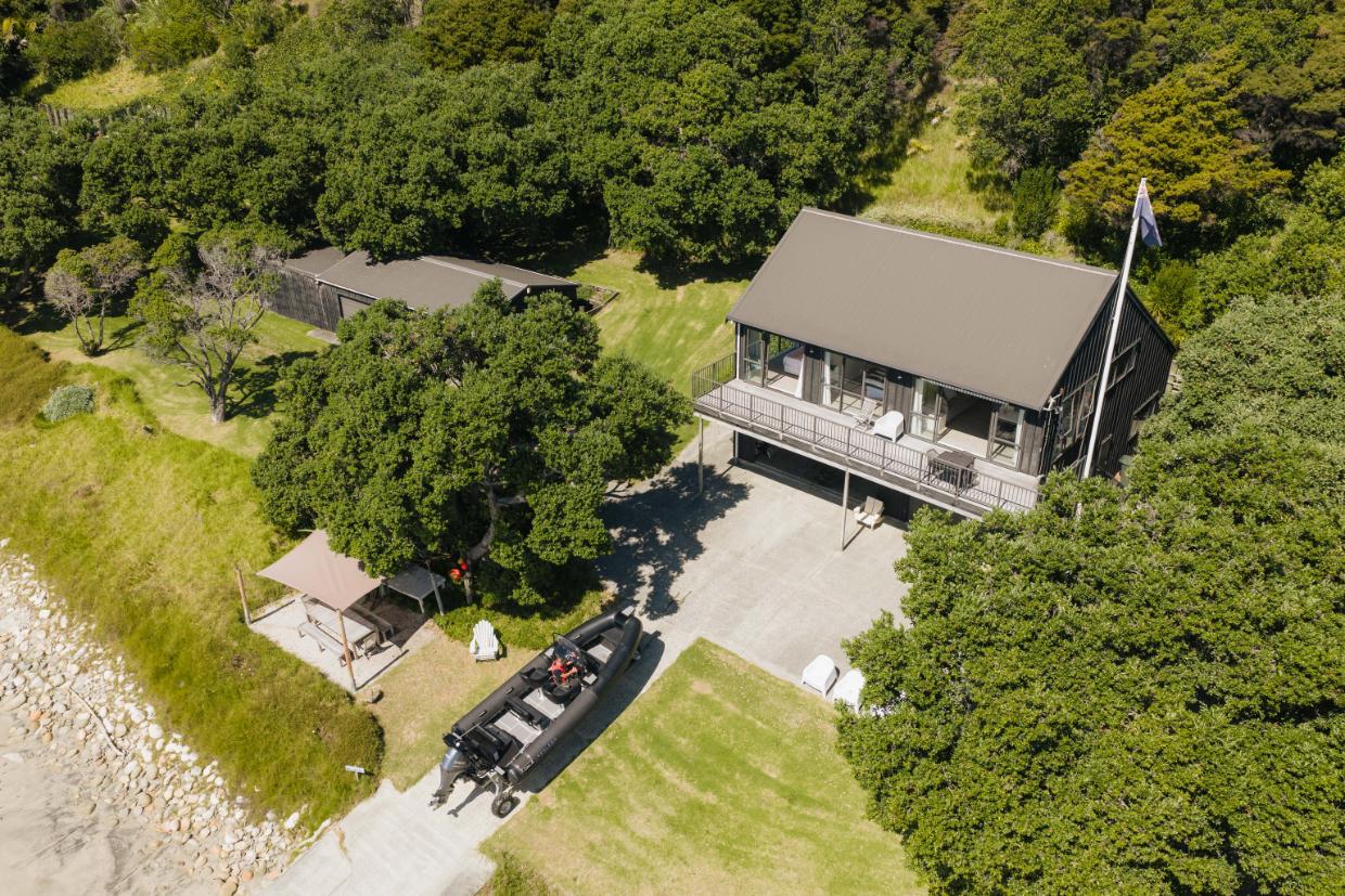 The Boatshed has three bedrooms and is close to the water. 