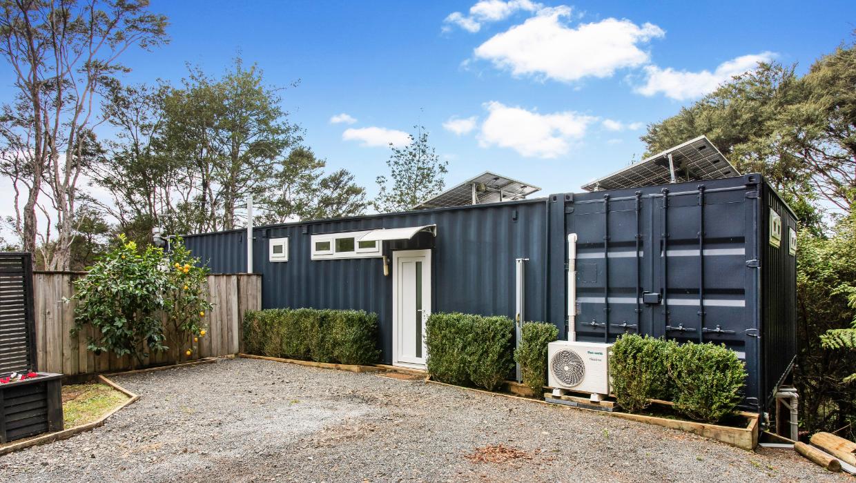View of the solar panels on the roof of the container home.