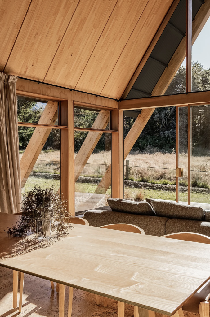 Exposed beams and a simple material palette create a relaxed aesthetic, perfectly suited to the rural alpine setting