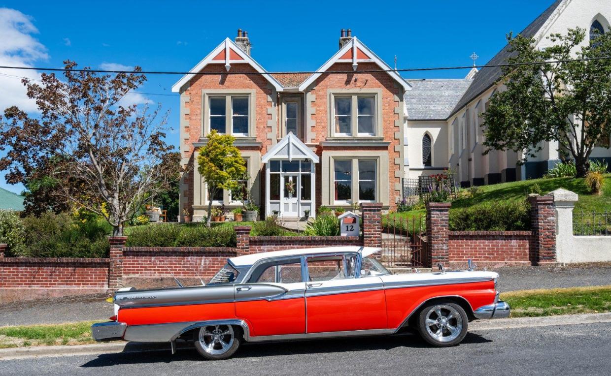 Originally on one title, the property was subdivided by current owners, seen from outside.