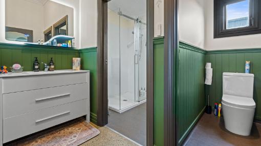 A toilet cubicle was converted into a shower room. Photo: Bayleys/TRADE ME