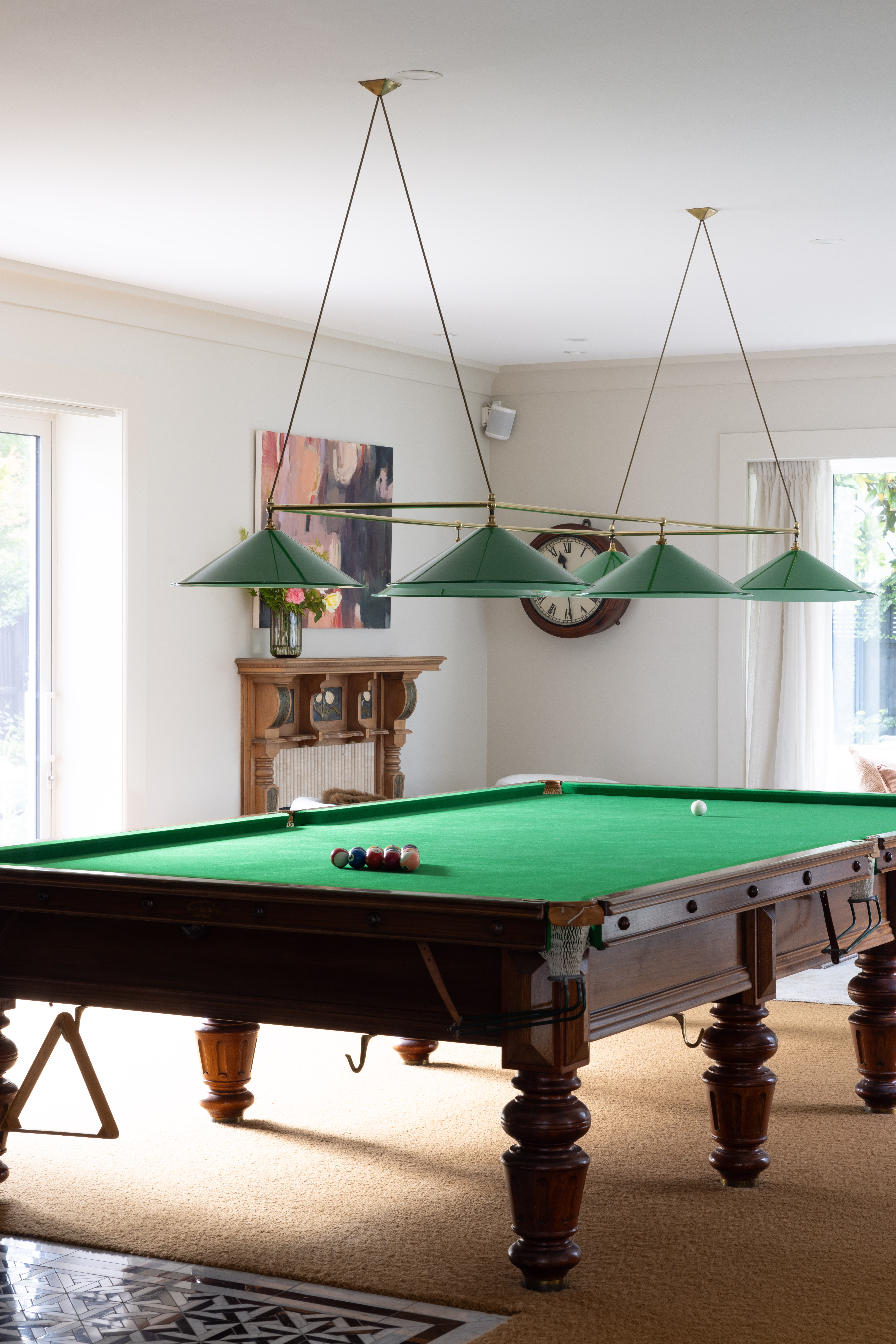 The billiard table in the bar area belonged to Isabelle's grandfather. "We use this room all the time in winter when we're entertaining," says Tim.