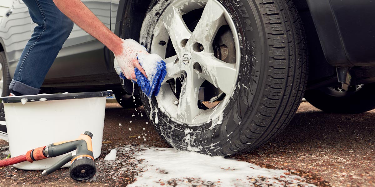 cleaning car wheel