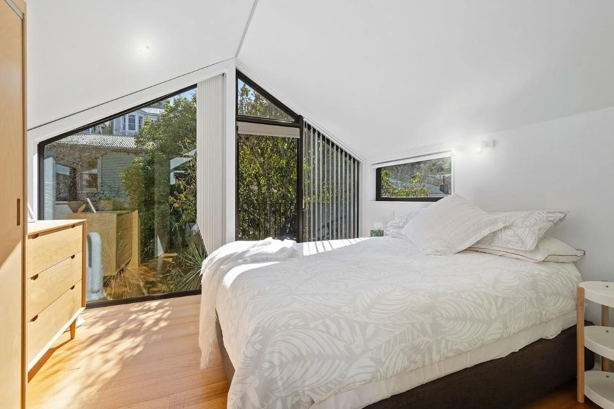 Aro Valley house, bedroom with large windows