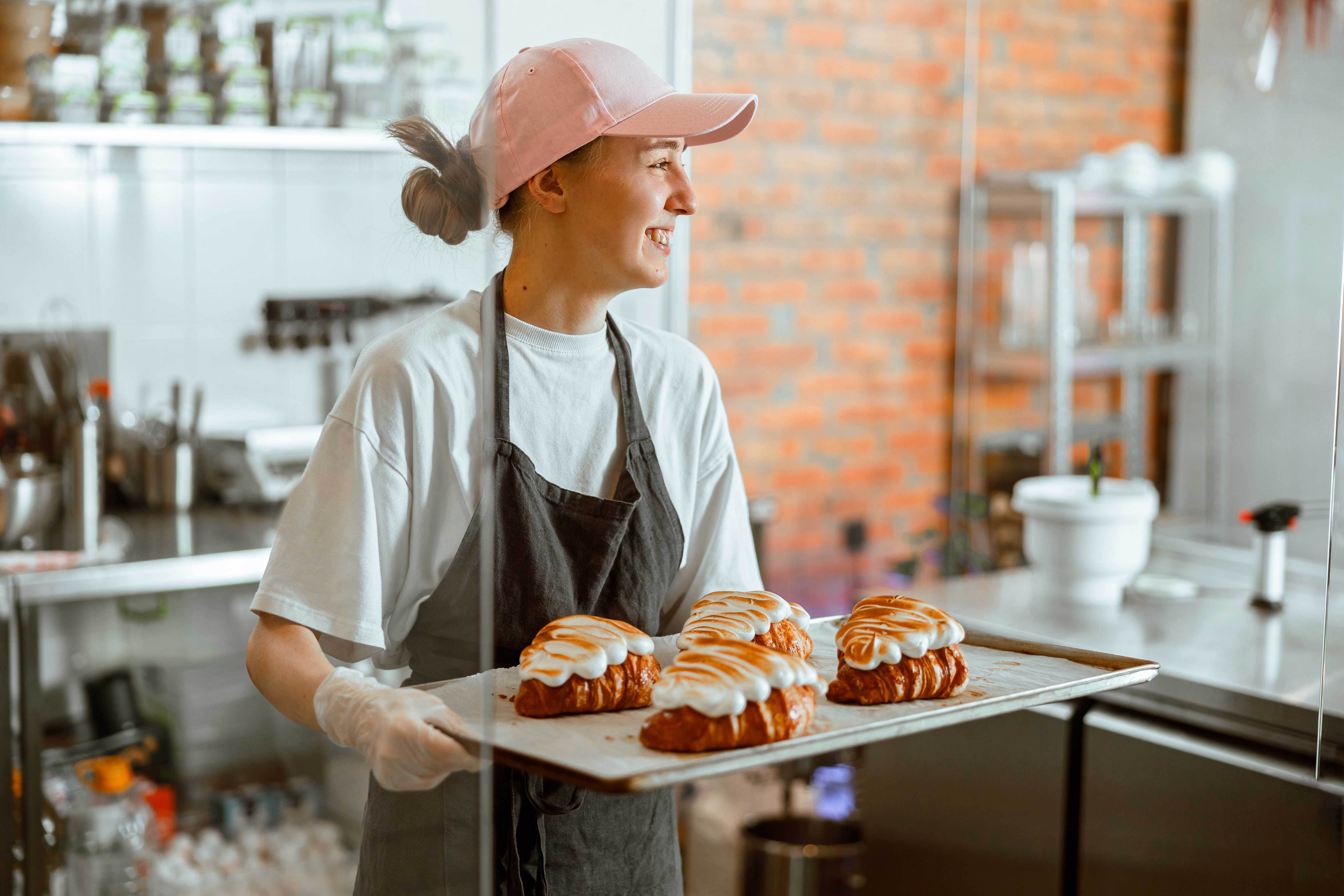 Baker carrying pastries
