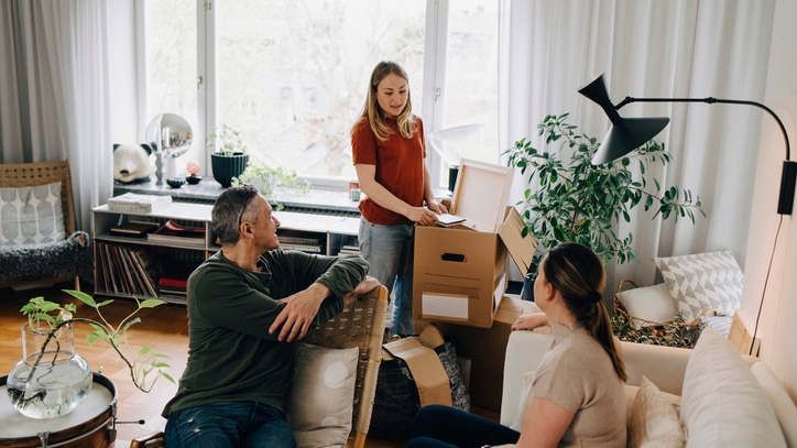 Woman moving in to a house that her parents helped her buy.