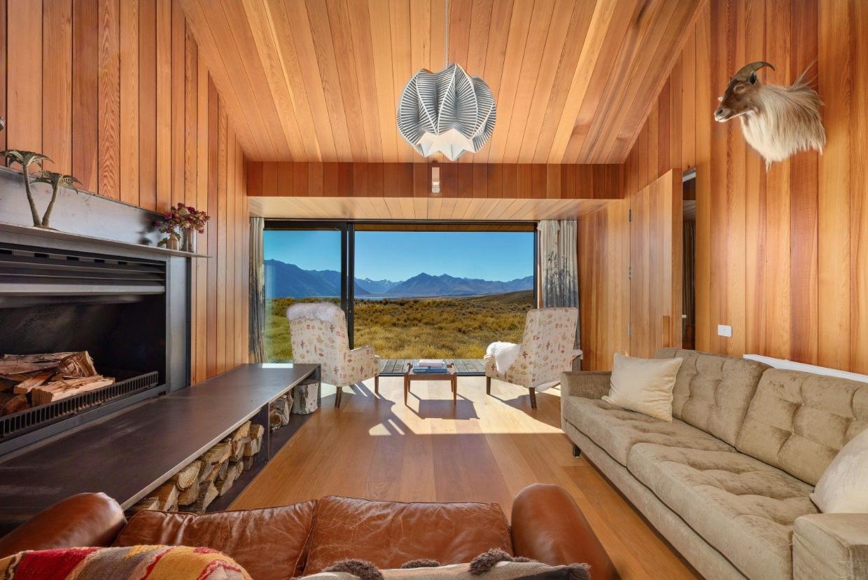 The main living room is fully lined with timber. Photo: NZ Sotheby's