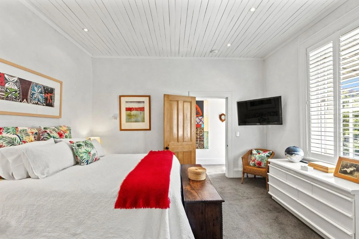 One of the four bedrooms.