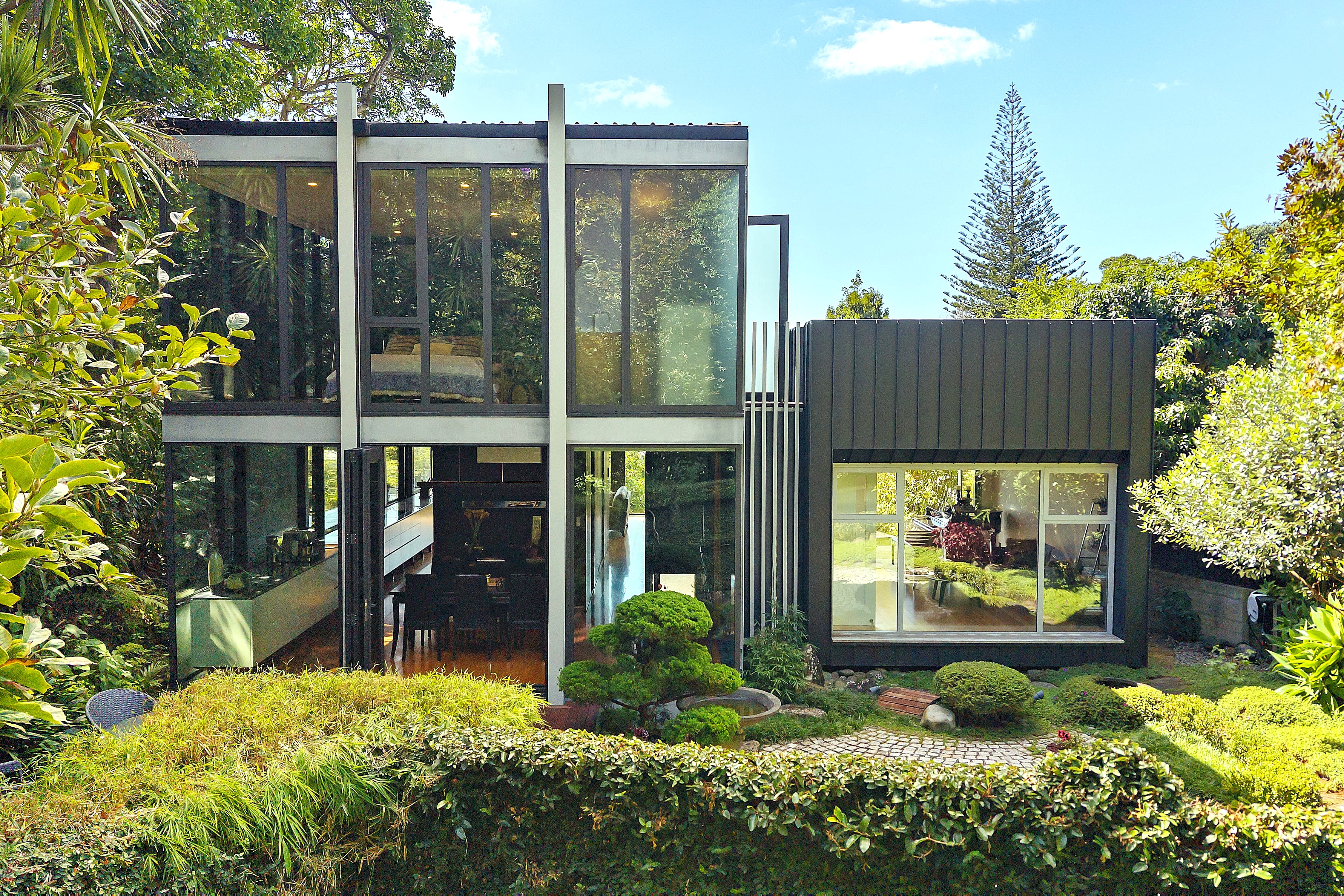 Modernist glass house for architect’s family still ultra cool nearly 20 years on