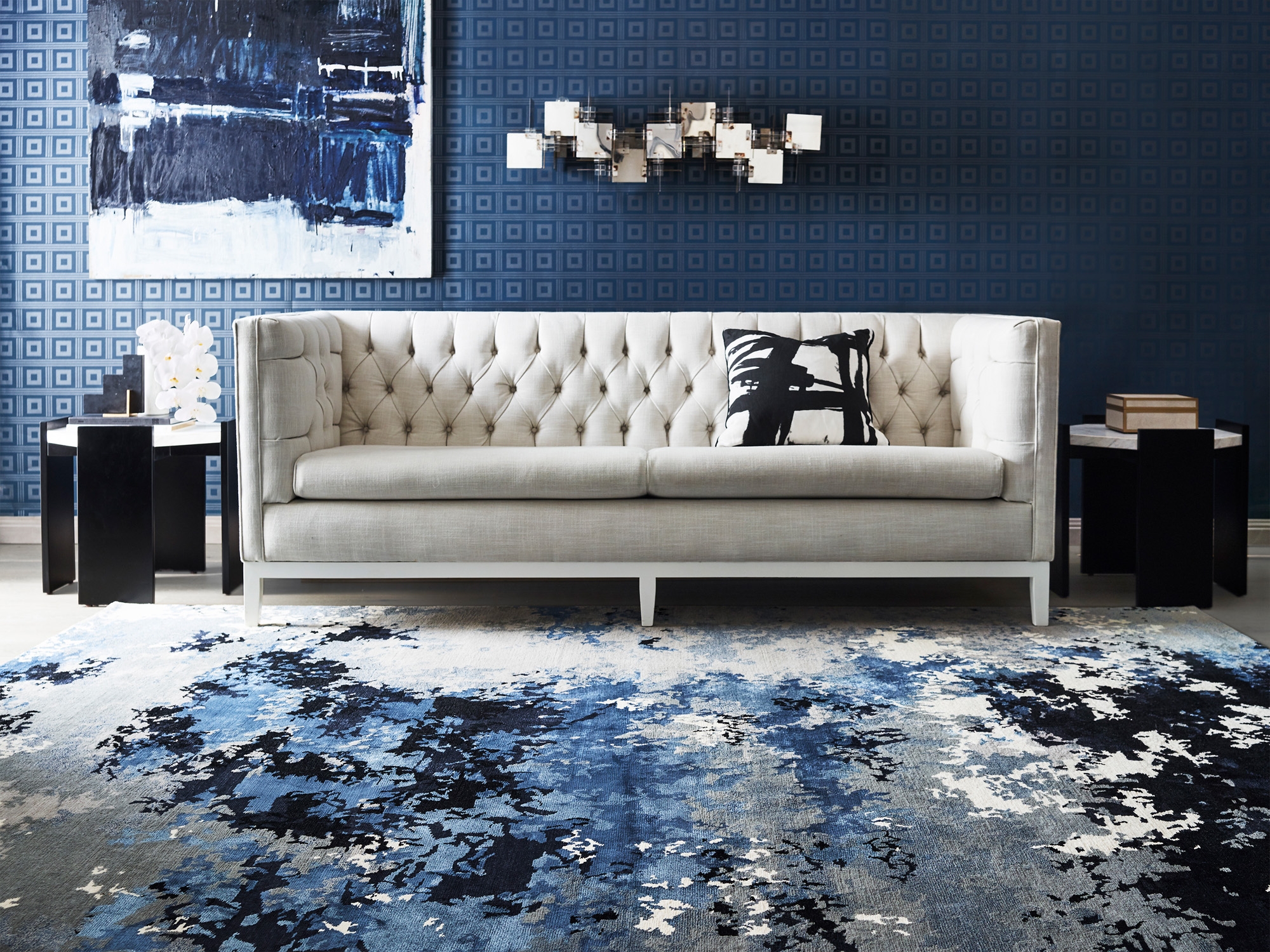 An abstract design, Vapour by Greg Natale from Designer Rugs, incorporating both deep colours and neutrals makes a bold statement within this masculine interior. 