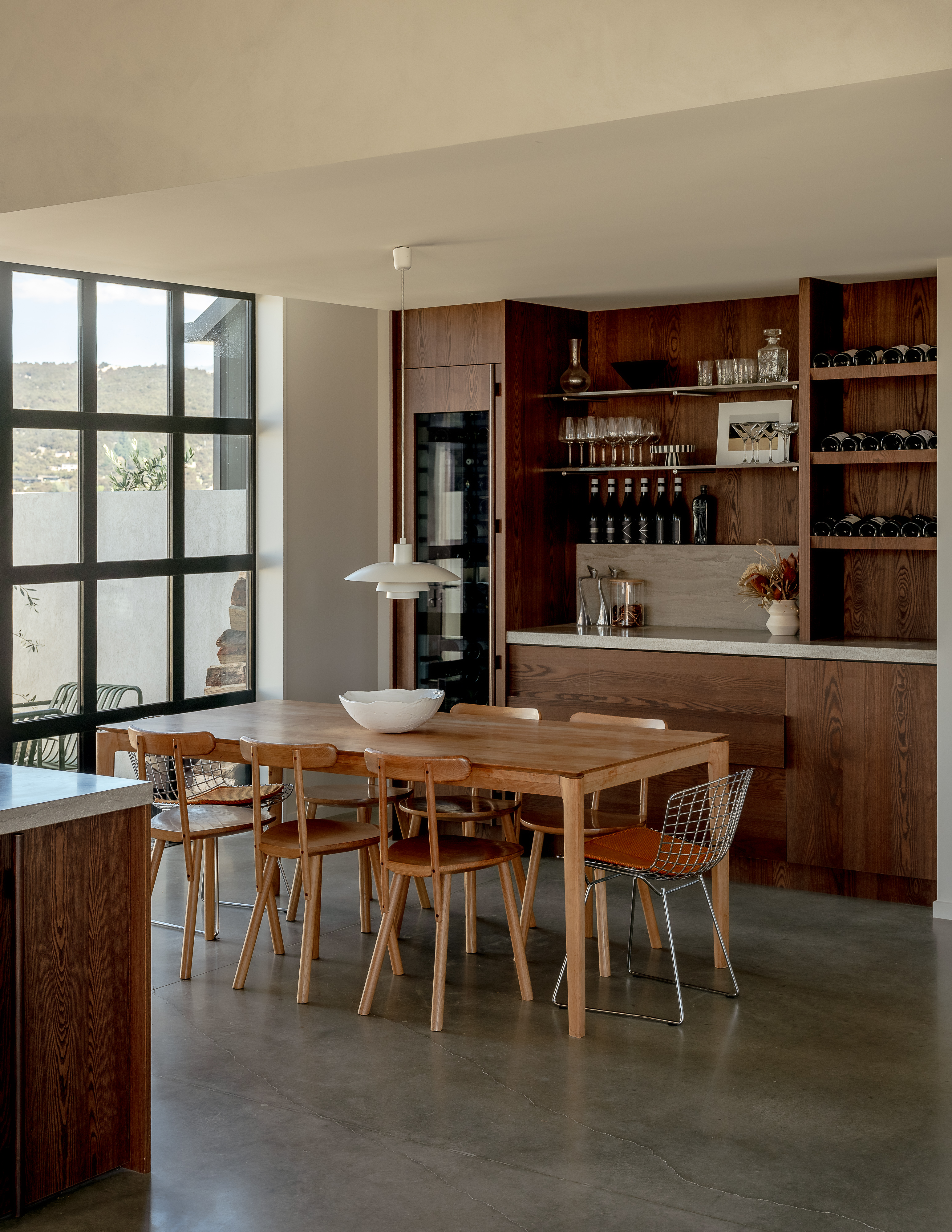 “Inserting the full-height Fisher & Paykel wine fridge and the cool drawer into the cabinetry in the dining space was a genius move,” says Alisha. “I can’t wait until the snow’s on the mountains and we can get an après-ski mood going.”