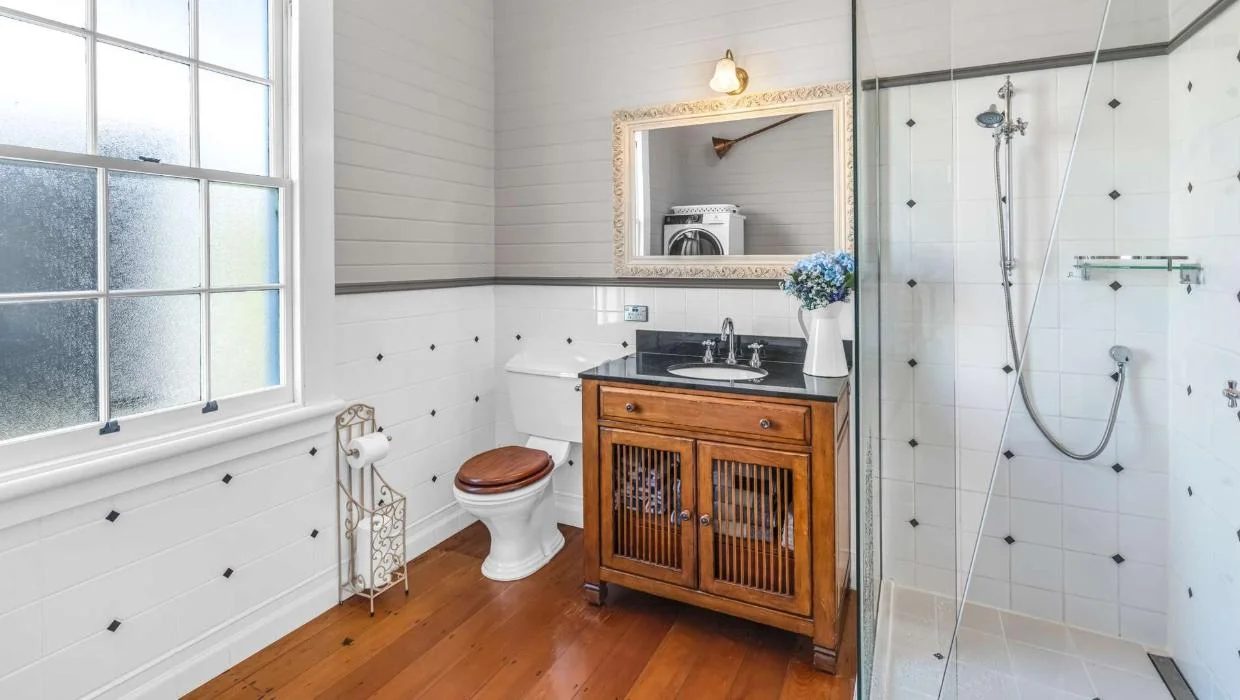 Even the refitted bathroom maintains the period style.