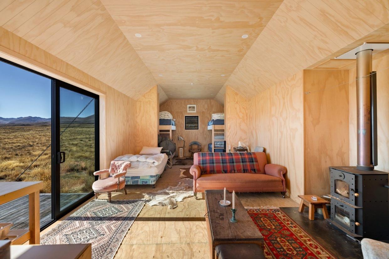Plywood lines the interior of the hut - from top to bottom. Photo: NZ Sotheby's