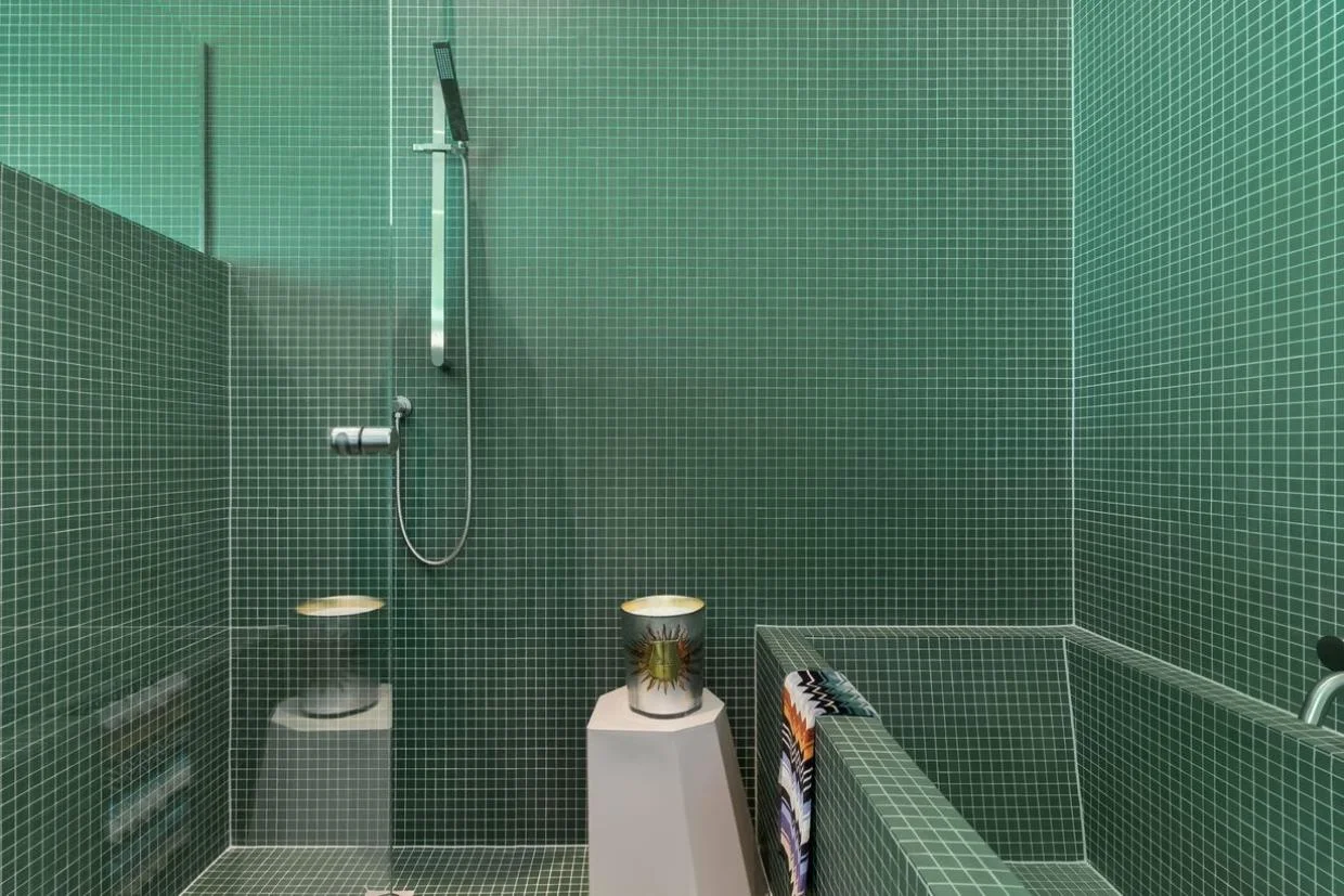The bathroom is a nod to the home's 70s origins.