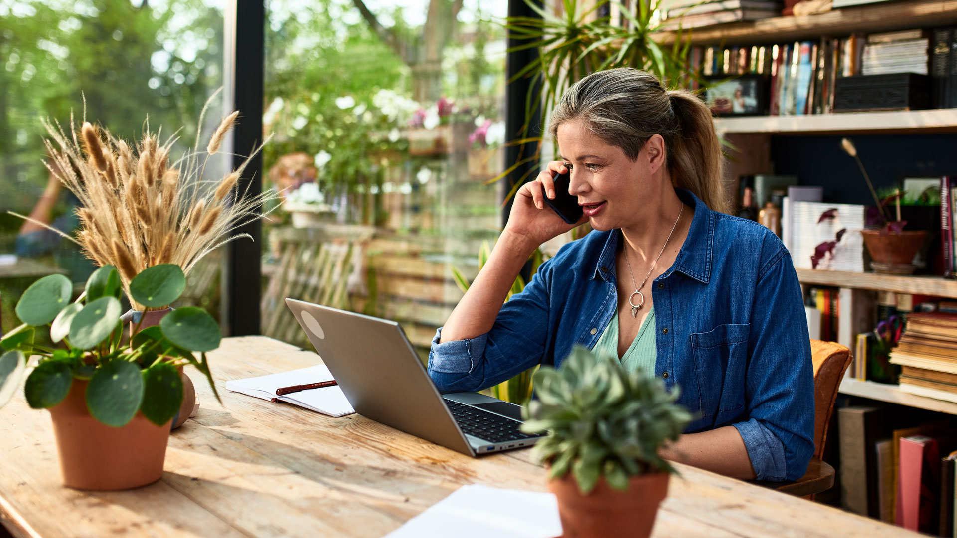 Landlord on the phone to a prospective tenant to tell them they have got the tenancy.